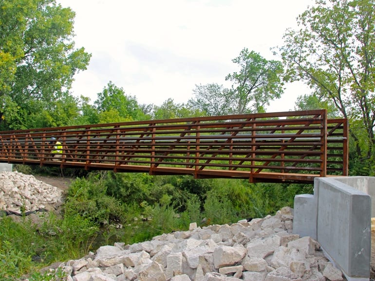 Wide view of new prefab trail bridge
