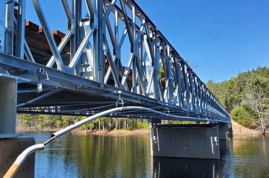 Close angled view of triple-span modular panel bridge