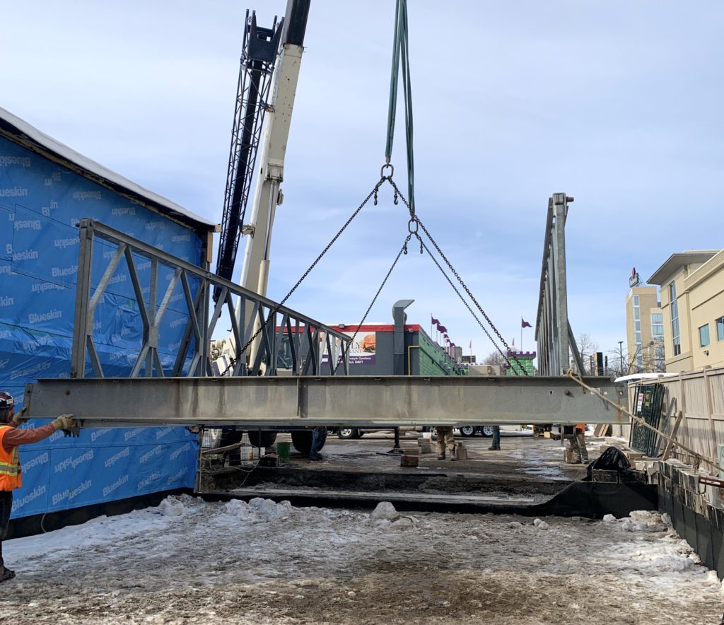 Crane lifting Bailey Bridge construction access bridge